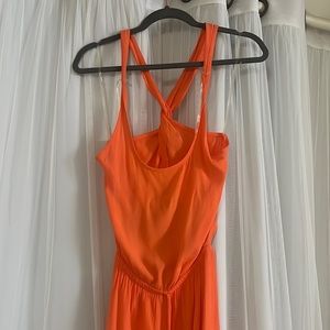 Black Bead small, orange jumpsuit.